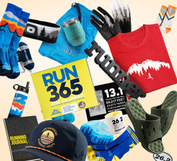 Running gift collection featuring apparel, socks, recovery slides, calendar, journal, home decor, and drinkware.