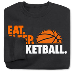 Black sweatshirt with orange and white text and a basketball graphic on a white background