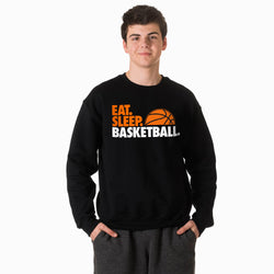 Person wearing a black sweatshirt with 'Eat. Sleep. Basketball.' text and basketball graphic.