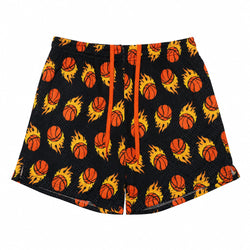 Black basketball shorts with an all-over print of orange basketballs engulfed in yellow flames, featuring a bright orange drawstring.