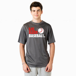 Person wearing a gray t-shirt with 'Eat. Sleep. Baseball.' text and a baseball graphic on a white background