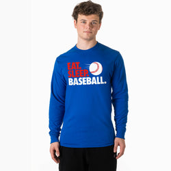 Person wearing a blue long-sleeve shirt with 'Eat, Sleep, Baseball' text and a baseball graphic on a white background