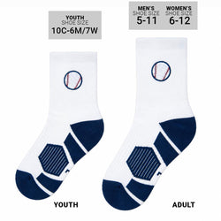 Two pairs of white crew socks with navy blue heels and toes, featuring a baseball graphic on the cuff, displayed against a solid white background.