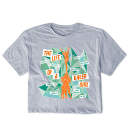 Gray t-shirt with colorful graphic design of a cheerleader and text on a white background
