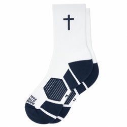 A pair of white athletic crew socks with navy blue accents, featuring a dark navy Christian cross on the upper calf, geometric patterned soles, and the words printed on the toe area.