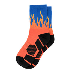 A pair of crew socks with a vibrant flame design. The upper portion features a blue cuff with orange and yellow flame patterns, while the lower portion is bright orange with black textured panels on the sole and black toe/heel sections.