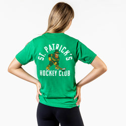 Person wearing a green t-shirt with 'St. Patrick's Hockey Club' design on the back.