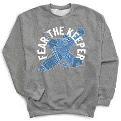 Gray sweatshirt with a graphic of a hockey goalie and 'Fear The Keeper' text on a white background