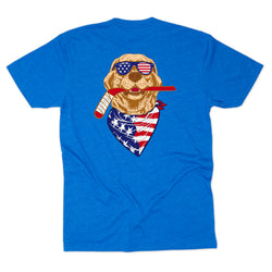 Blue t-shirt with a dog graphic wearing sunglasses and an American flag bandana on a white background