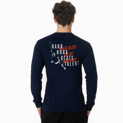 Person wearing a navy long-sleeve shirt with motivational quote on the back, on a white background