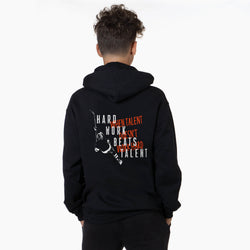 Person wearing a black hoodie with motivational hockey text on the back against a white background