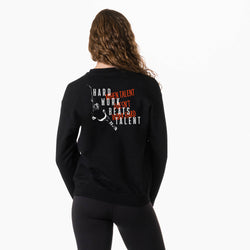 Person wearing a black sweatshirt with motivational text on the back, on a white background
