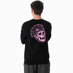 A person viewed from the back wearing a black long-sleeve sweatshirt with a large pink graphic on the back showing a skull in a hockey helmet and the text 'LEAVE IT ALL ON THE ICE'.