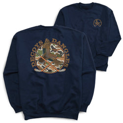 A navy crewneck sweatshirt shown from both the front and back. The back features a large circular graphic with a duck, crossed hockey sticks, and the text 'DECOYS & DANGLES' in brown. Small logo in a similar design on front.
