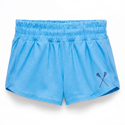 Light blue athletic shorts with a subtle speckled pattern and a small crossed lacrosse sticks graphic on the lower left leg, shown against a plain white background.