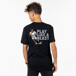 Person wearing a black lacrosse t-shirt with a bigfoot graphic and text on the back, on a white background
