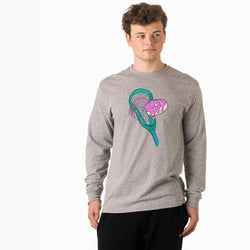 Person wearing a gray long-sleeve shirt with a colorful lacrosse stick with donut design on a white background