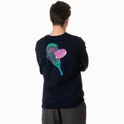 Person wearing a black sweatshirt with a colorful lacrosse stick with donut design on the back against a white background