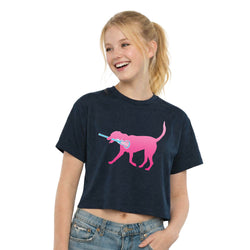 Girl wearing a navy t-shirt with a pink dog graphic on a white background