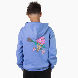 Person wearing a blue hoodie with a colorful ice cream lacrosse graphic on the back against a white background
