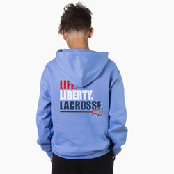 Person wearing a blue hoodie with 'Life Liberty Lacrosse' text on the back
