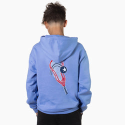 Person wearing a blue hoodie with a lacrosse stick graphic design on the back against a white background