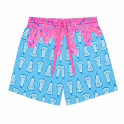 Blue and pink shorts featuring a repeating lacrosse stick pattern on a light blue background, with a bright pink dripping frosting-like top section and multicolored sprinkle details, complete with a pink drawstring.