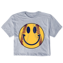 Gray t-shirt with a smiley face made from a softball on a white background