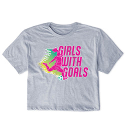 Gray t-shirt with 'Girls with Goals' graphic design featuring a girl and soccer ball on a white background.