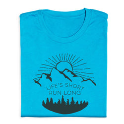 Folded blue t-shirt with mountain and sun graphic and 'Life's Short, Run Long' text on a white background