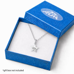 A silver 13.1 star pendant necklace on a delicate chain, presented inside an open blue gift box with a white insert.