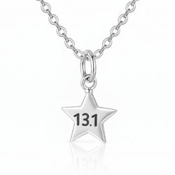 A silver star-shaped pendant necklace engraved with the number '13.1', suspended from a matching silver link chain against a clean white background.
