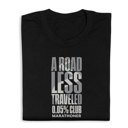 Black t-shirt with "A Road LEss Traveled' text on a white background