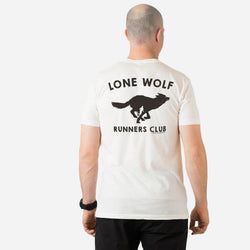 Person wearing a white t-shirt with 'Lone Wolf Runners Club' design on the back.