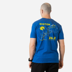 Person wearing a blue t-shirt with a map of the Boston Marathon route on the back.