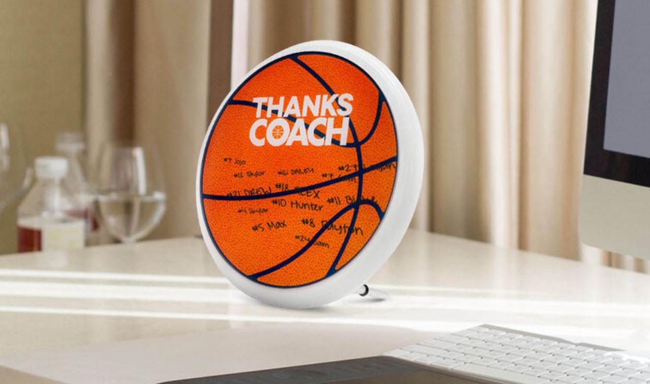 Basketball coach gift featuring a signature ball with "THANKS COACH" text and personalized player names