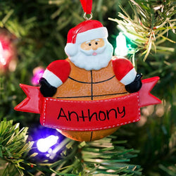Personalized basketball Christmas ornament featuring a Santa Claus figure and a red name banner.