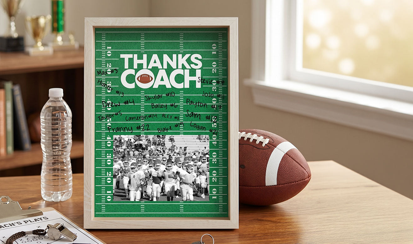 Framed picture with 'Thanks Coach' text on a green field design, placed on a table with a football and water bottle