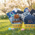 Easter baskets filled with sports-themed products on a grassy field