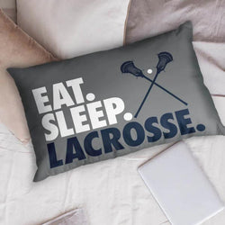 Gray lacrosse pillowcase featuring Eat Sleep Lacrosse slogan and crossed sticks graphic.