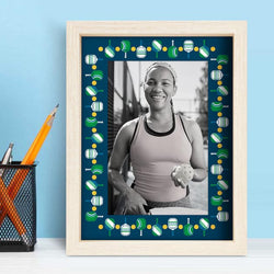 Navy blue pickleball photo frame featuring a repeating green paddle and yellow ball pattern.