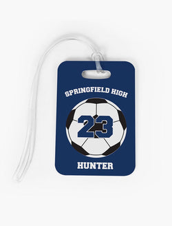 Custom soccer bag tag featuring a soccer ball graphic and personalized text for team, name, and number.