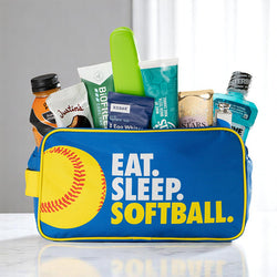 Blue accessory bag with text eat sleep softball and a softball design showing an assortment of items inside.