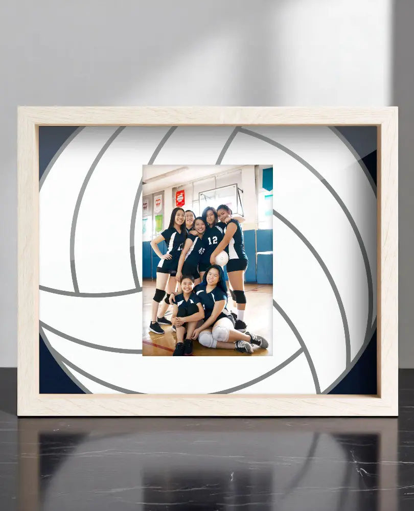 Framed picture of a volleyball team inside a volleyball-themed frame