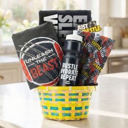 Wrestling gift basket featuring a t-shirt, water bottle, and a sticker.