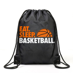 Black drawstring bag with 'Eat. Sleep. Basketball.' text and basketball graphic on a white background