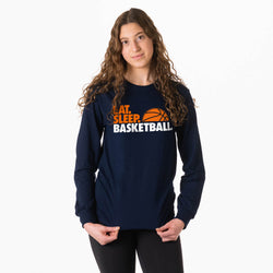 Person wearing a navy blue long-sleeve shirt with 'Eat Sleep Basketball' text on a white background