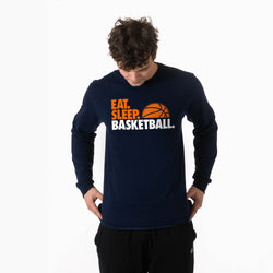 Person wearing a navy long-sleeve shirt with 'Eat Sleep Basketball' text and basketball graphic on a white background