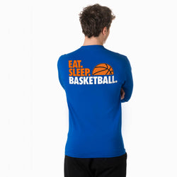 Person wearing a blue shirt with 'Eat. Sleep. Basketball.' text and basketball graphic on the back.