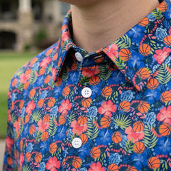 Close-up of a colorful polo shirt with basketball and floral pattern